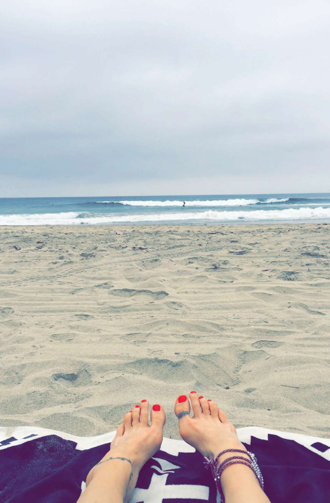 toes on the beach_surfer on the waves