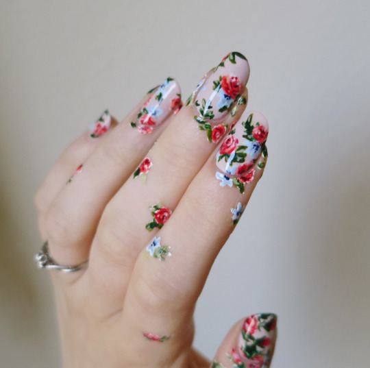 floral nails + floral hand tattoos