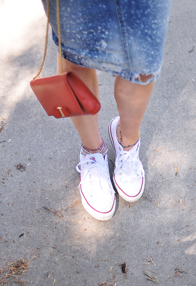 white chuck taylors_anklet_ferragamo miss vara red bag_deconstructed denim skirt